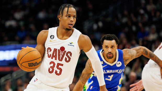 Cleveland Cavaliers guard Isaac Okoro (35) drives for the basket in front of Milwaukee Bucks guard George Hill (3) during the fourth quarter at Fiserv Forum.